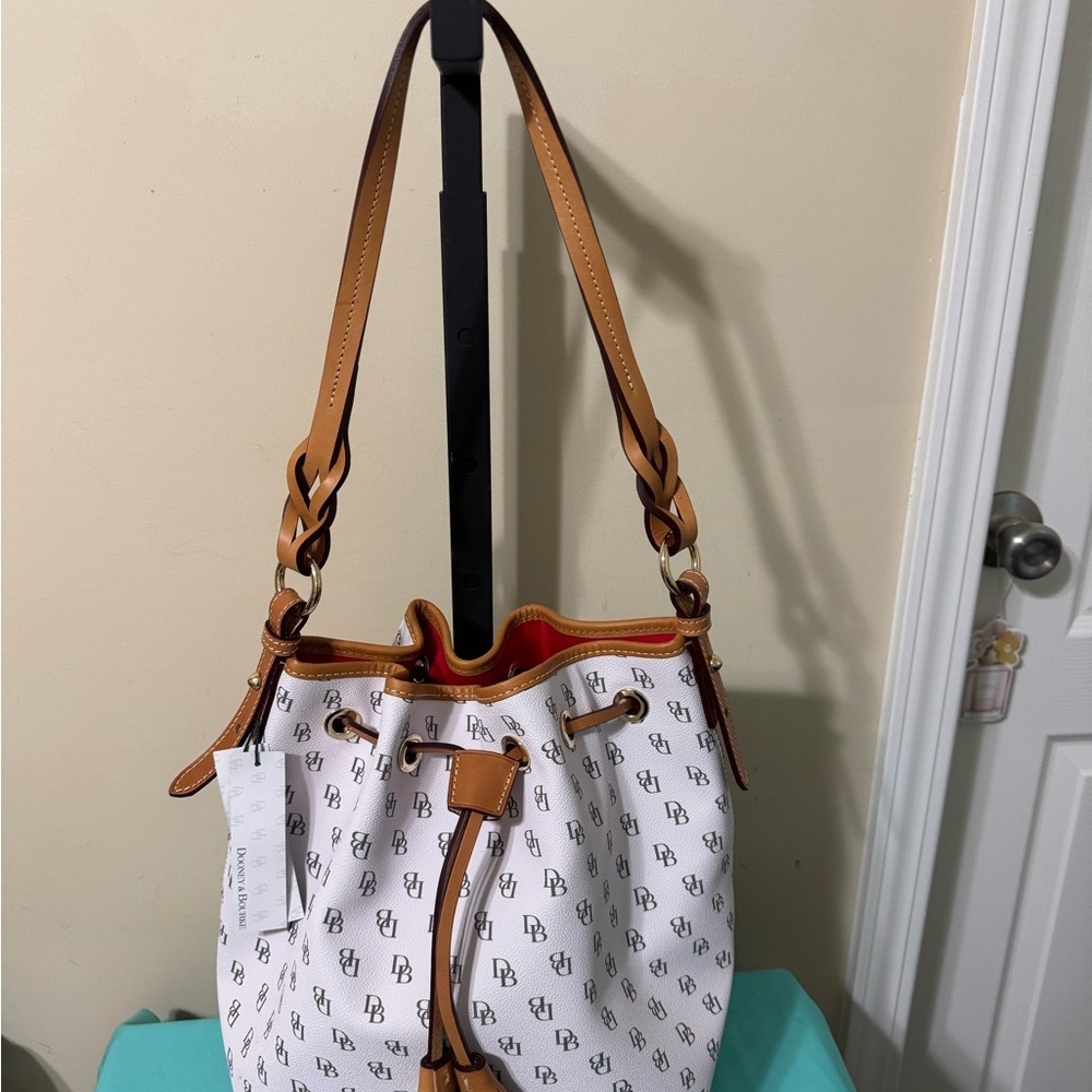 Dooney & Bourke White And Tan Drawstring Bag